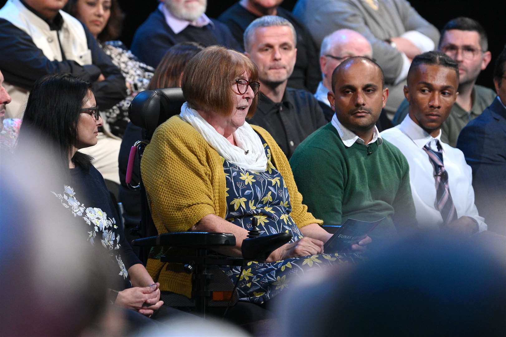 An audience member asks a question about the NHS, with answers from Rishi Sunak and Sir Keir Starmer drawing both laughs and groans (Jonathan Hordle/ITV/PA)