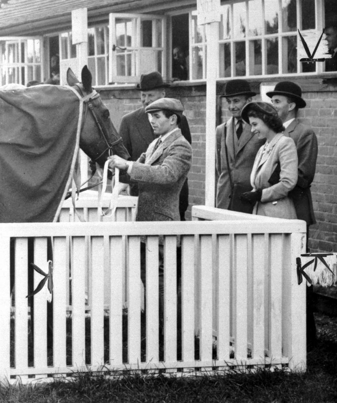 Princess Elizabeth inspecting Monaveen after the win at Fontwell Park in 1949 (PA)