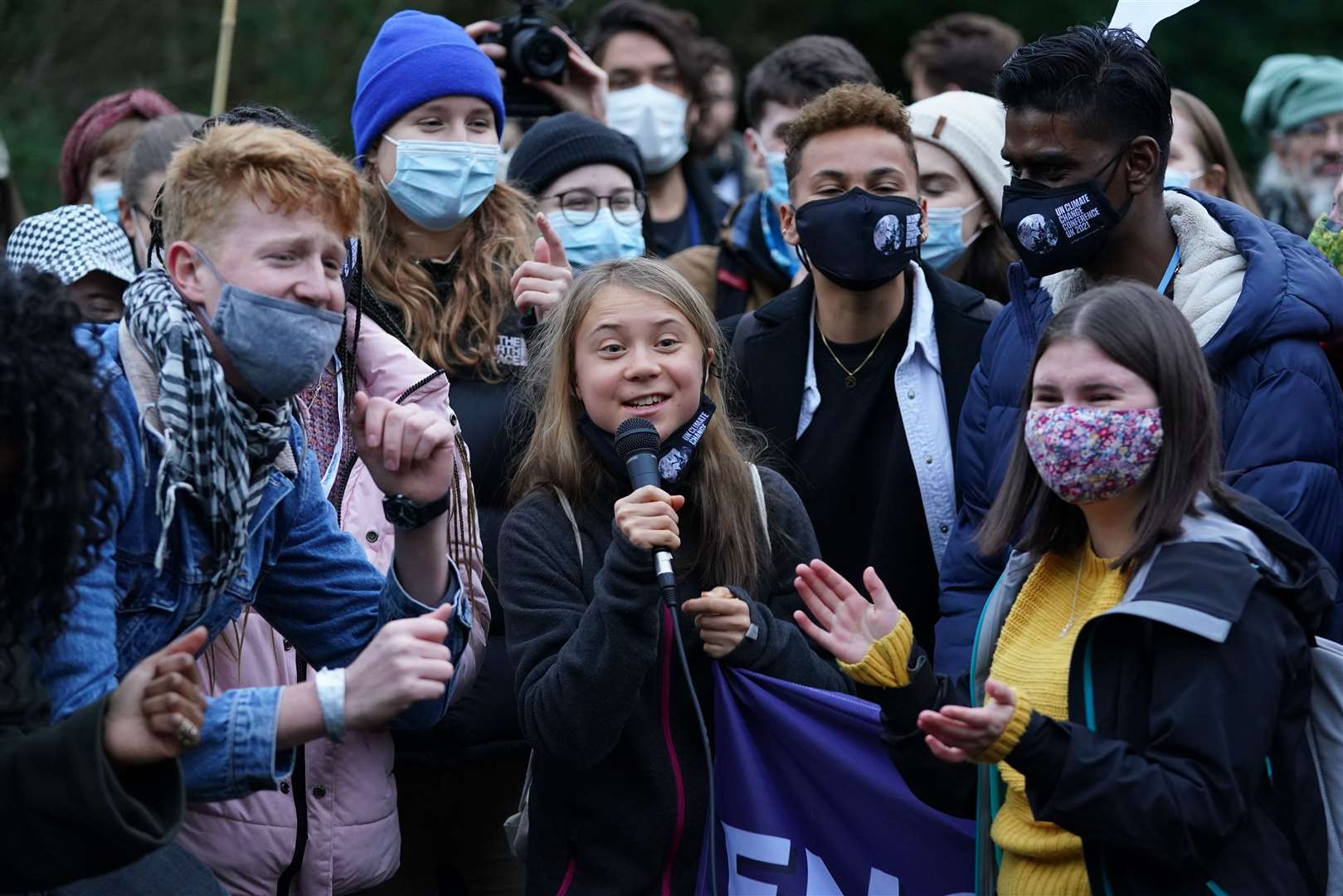 Greta Thunberg alongside fellow climate activists during a demonstration at Festival Park, Glasgow, on the first day of Cop26 (Andrew Milligan/PA Wire)