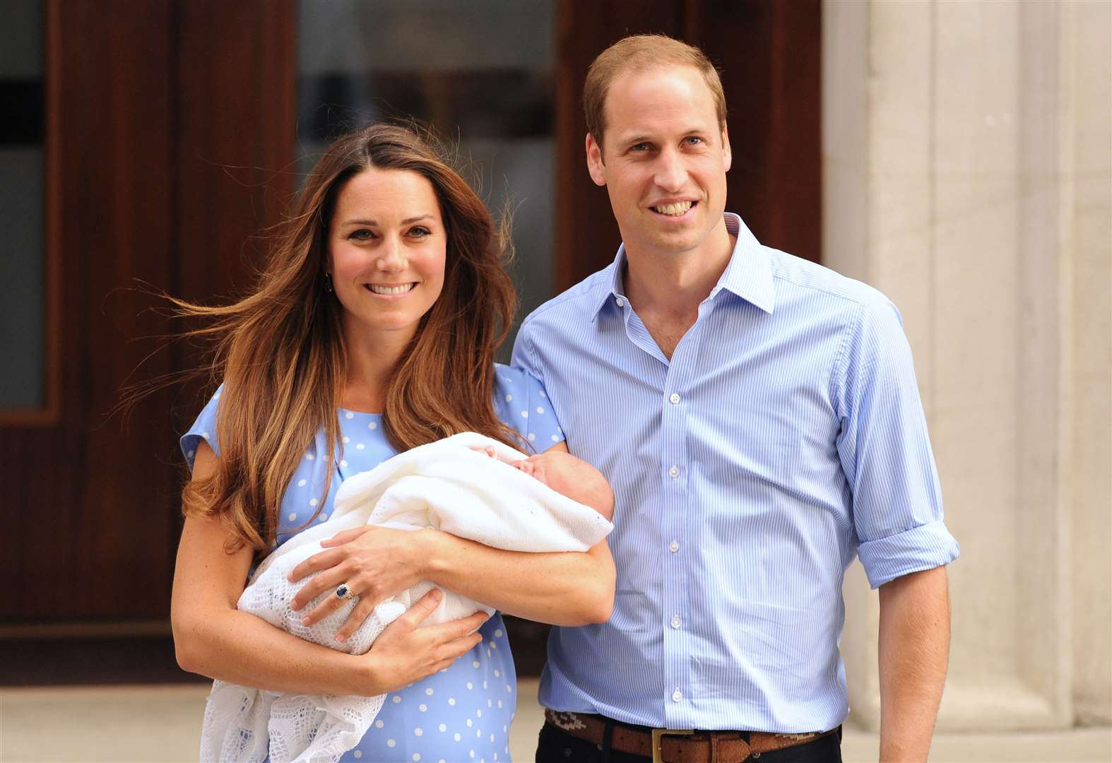 William and Kate leave the Lindo Wing of St Mary’s Hospital in London, with their newborn son, Prince George (Dominic Lipinski/PA)