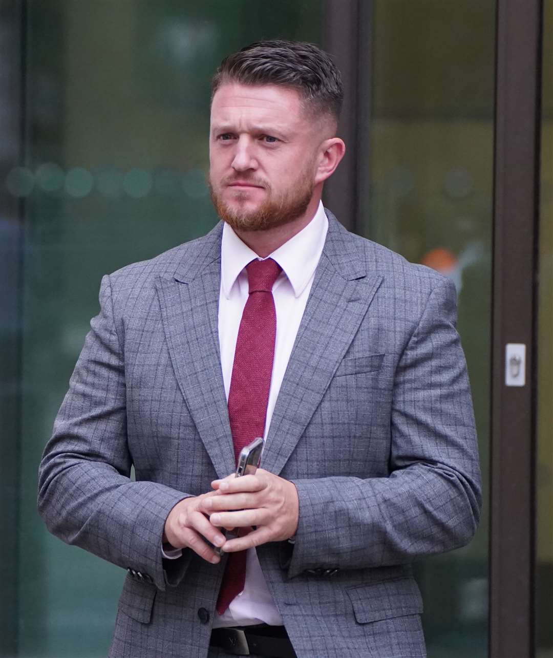 Tommy Robinson outside Westminster Magistrates’ Court (Stefan Rousseau/PA)