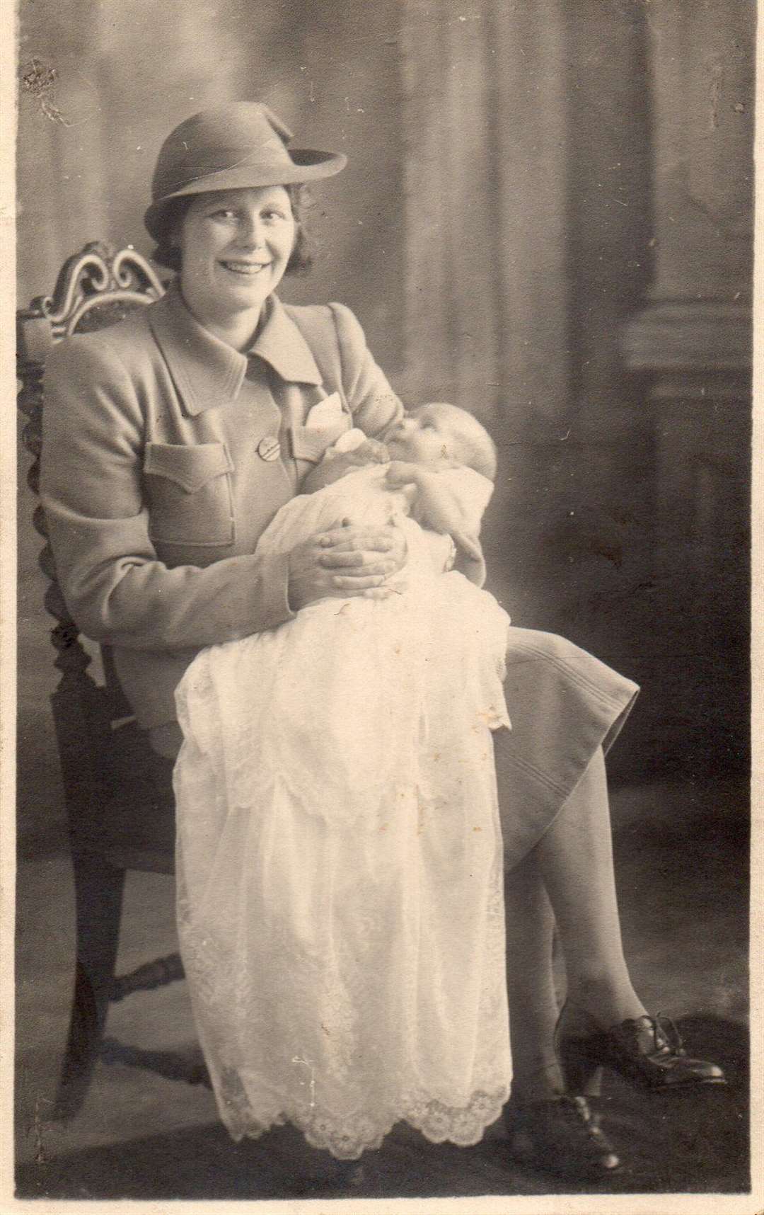 Ted Honey as a baby being held by his mother Violet