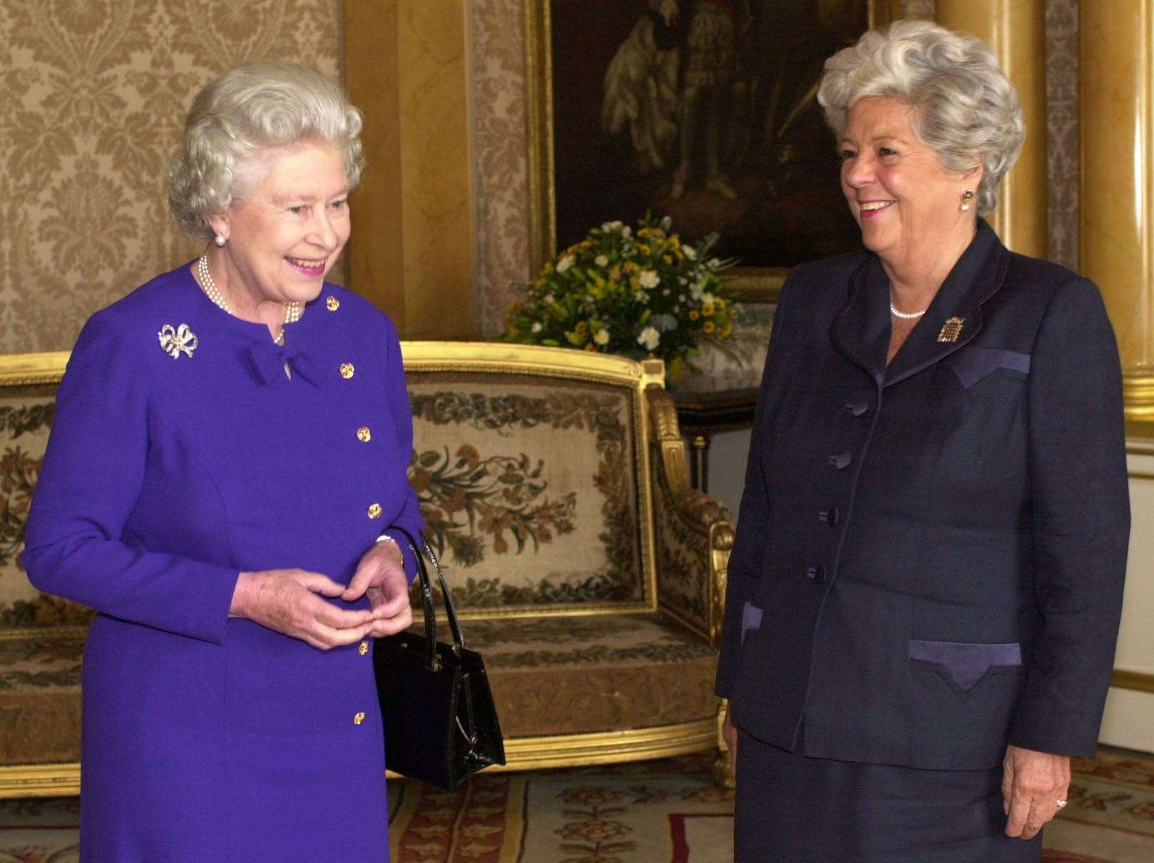 Queen Elizabeth sharing a joke with Betty Boothroyd (PA)