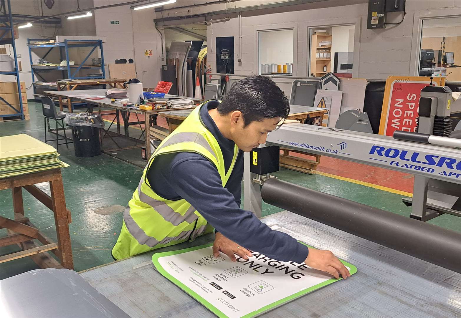 Tirthraj Thapa, an ex-Gurkha soldier and an amputee, working in the sign shop at the RBLI village in Aylesford