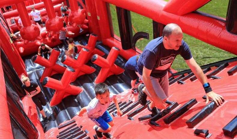 Make your way through huge inflatables at Brands Hatch. Picture: UK Running Events