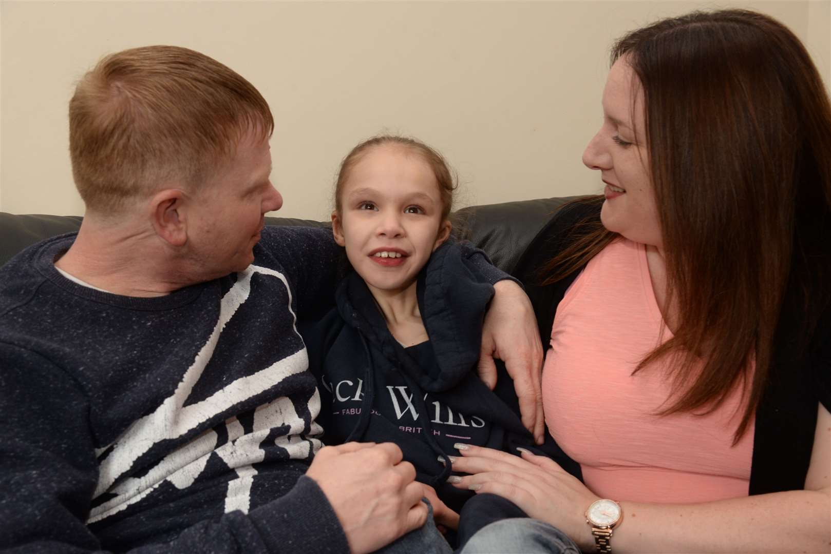 Lee Moore and Emma Appleby with daughter Teagan. Picture: Chris Davey