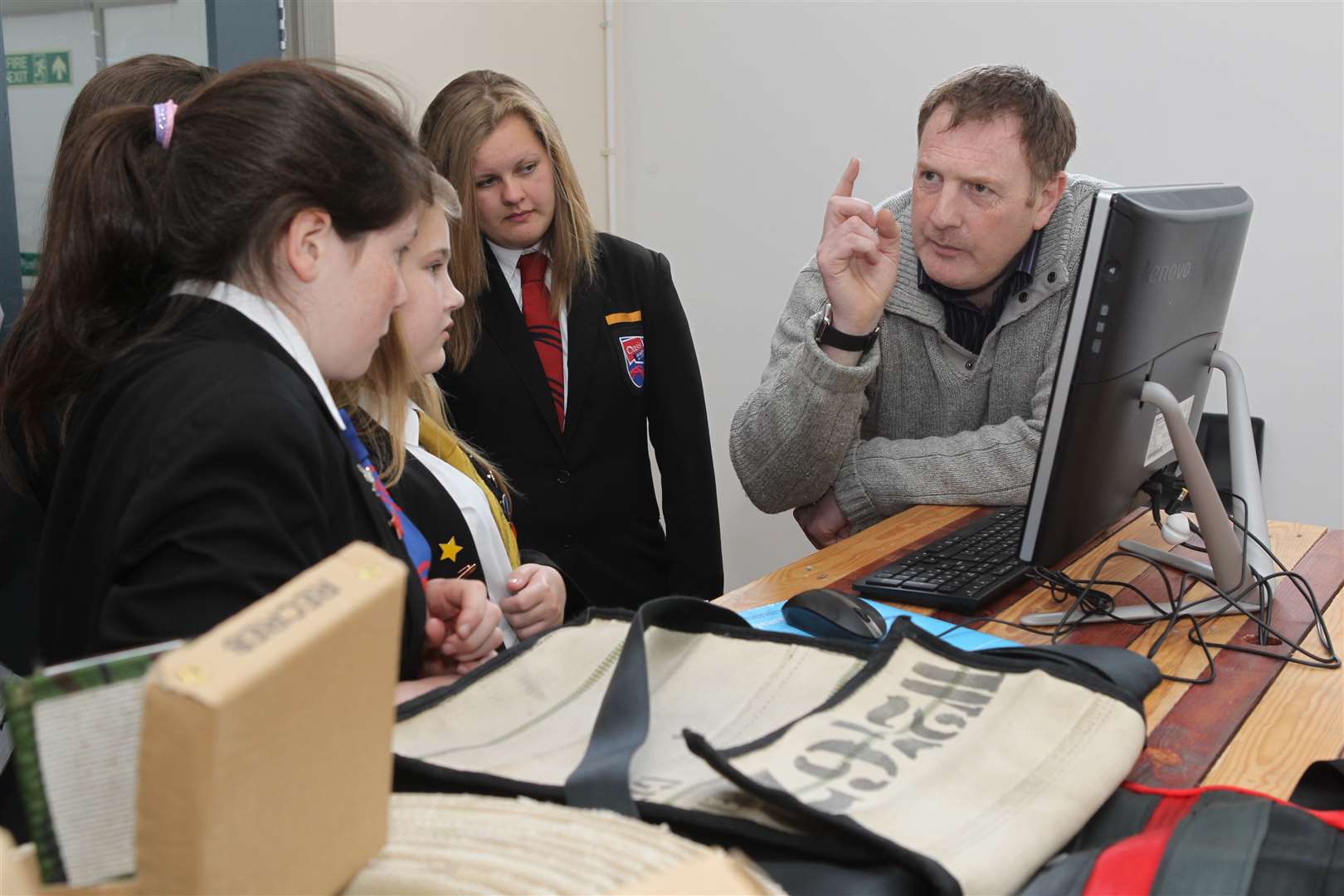 Pupils from Oasis Academy listen to Andrew Deeley, CEO at Recre8 to learn about up-cycling in an Apprentice style event the school is holding