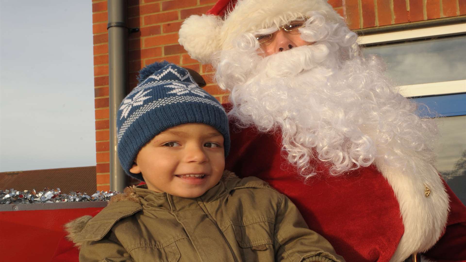 Harrison Lee, aged three, and Father Christmas at St Edwards Catholic primary.