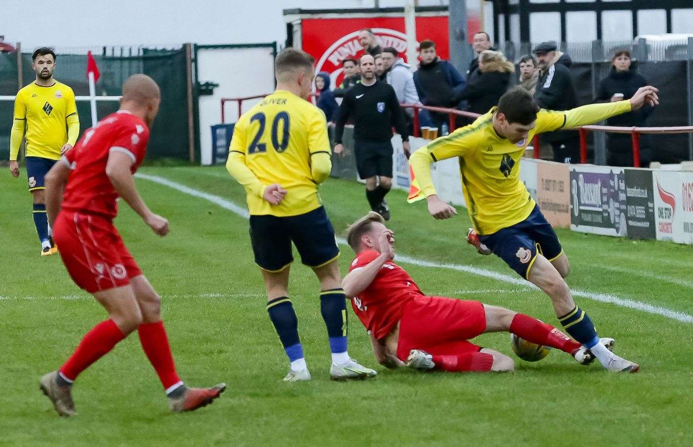 Whitstable striker Harvey Smith is brought down by a home man in the Oystermen’s 4-2 weekend defeat. Picture: Les Biggs