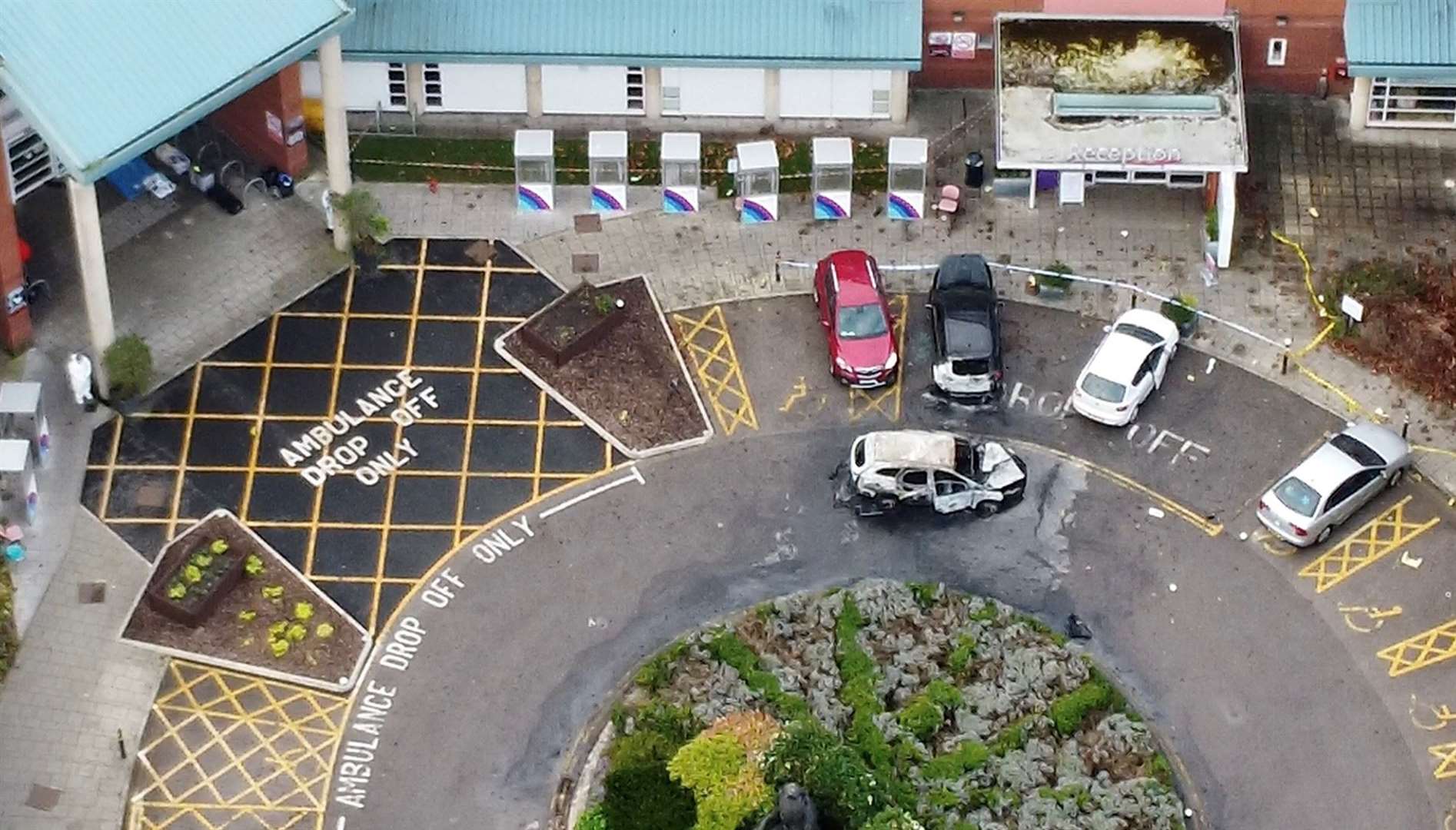 Aerial view of David Perry’s burnt-out taxi cab outside the Liverpool Women’s Hospital (Peter Byrne/PA)