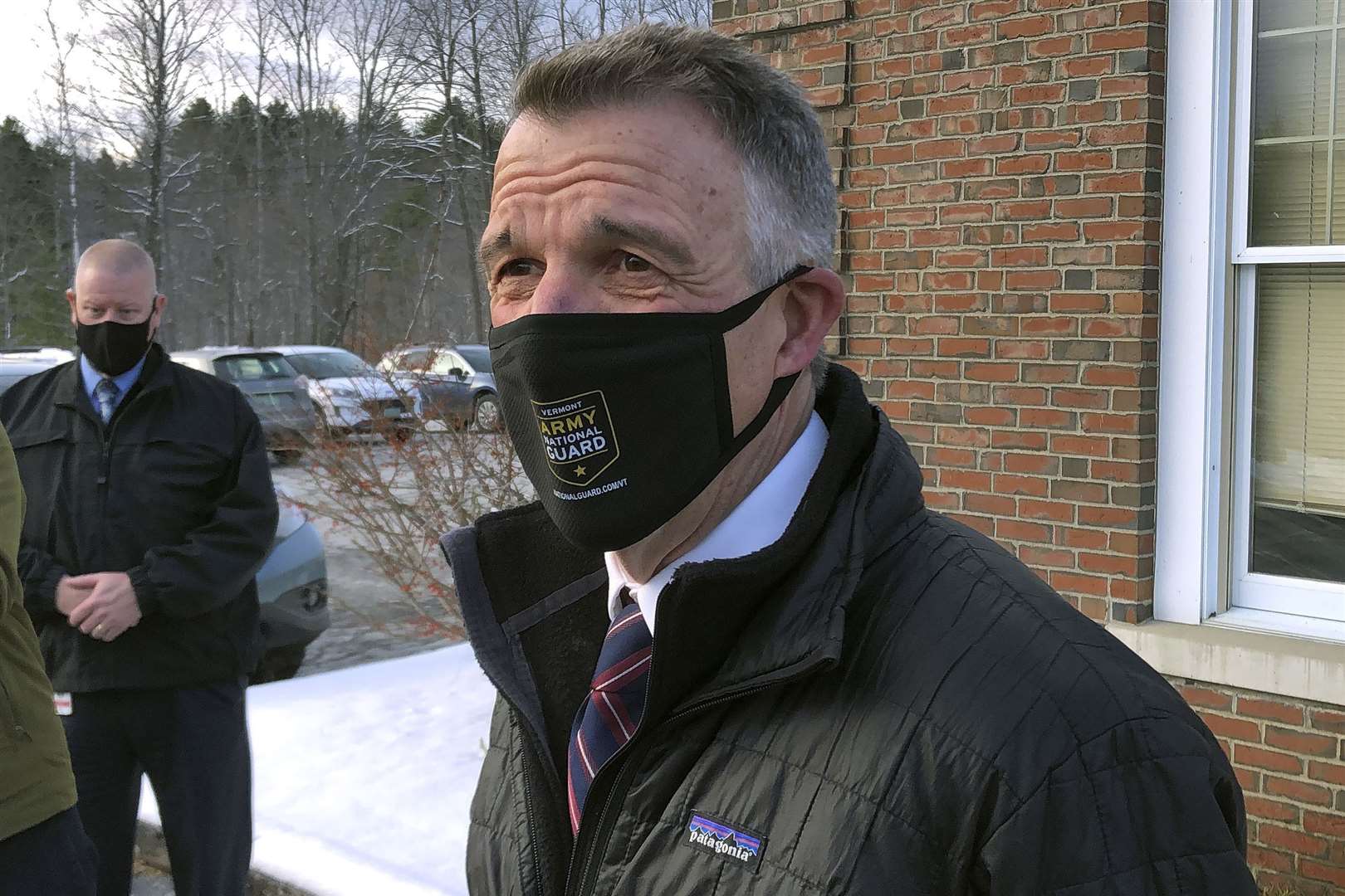 Vermont’s Republican governor Phil Scott speaks to reporters after voting for Joe Biden, a Democrat (Wilson Ring/AP)