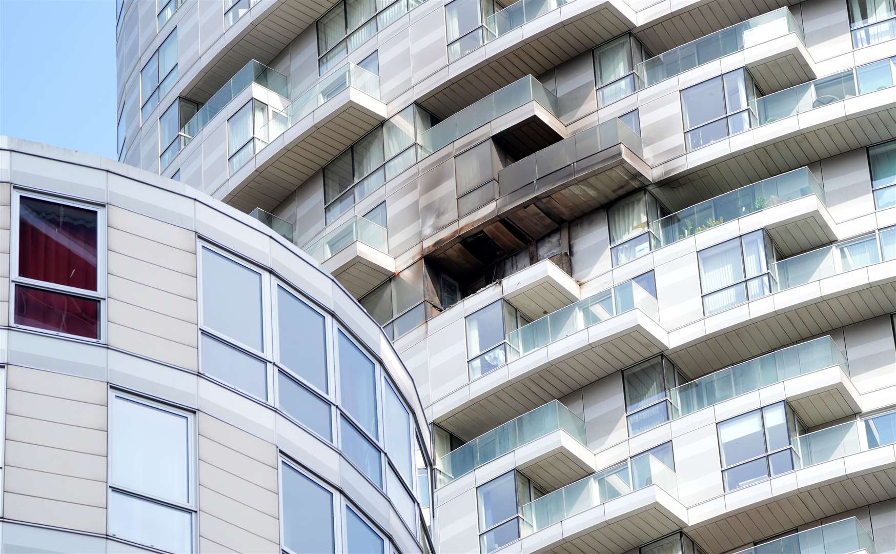 The ‘entirety of a balcony’ on the 25th floor of the tower block was destroyed by the fire (Jonathan Brady/PA)