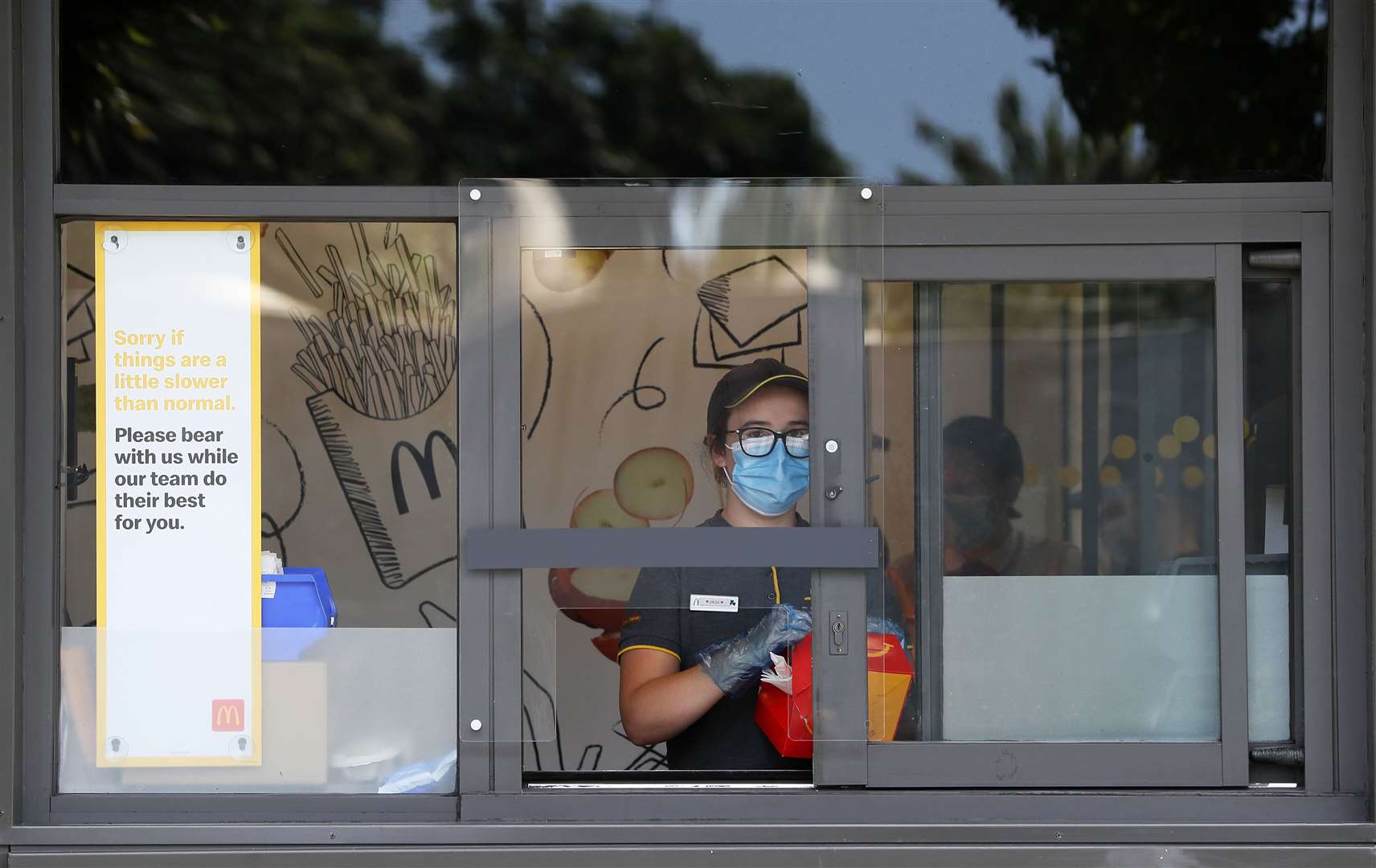 Staff wearing protective equipment (Brian Lawless/PA)