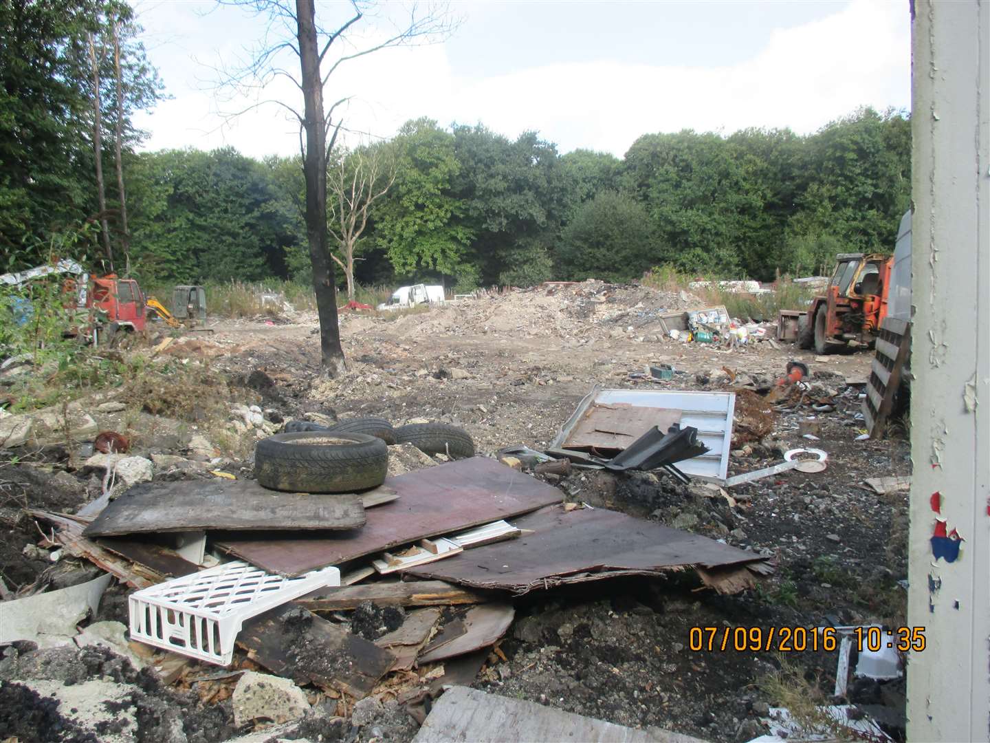 Wooden sheets and what looks like a scorched tree in the middle of Boxley Wood on land owned by Langley Beck in 2016. Picture: Maidstone Borough Council