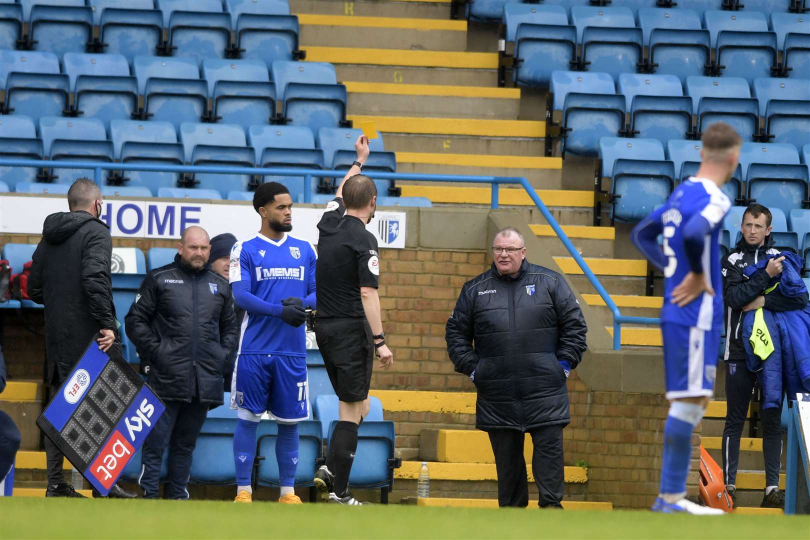 Manager Steve Evans is shown a yellow card by referee Sam Purkiss after protesting over Sunderland's penalty Picture: Barry Goodwin