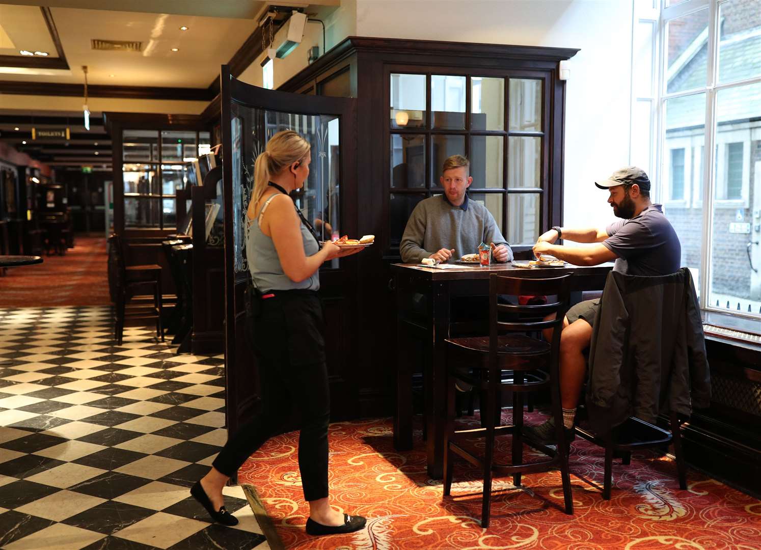 At the Shakespeare’s Head pub in Holborn, customers were in early ordering breakfast (Yui Mok/PA)