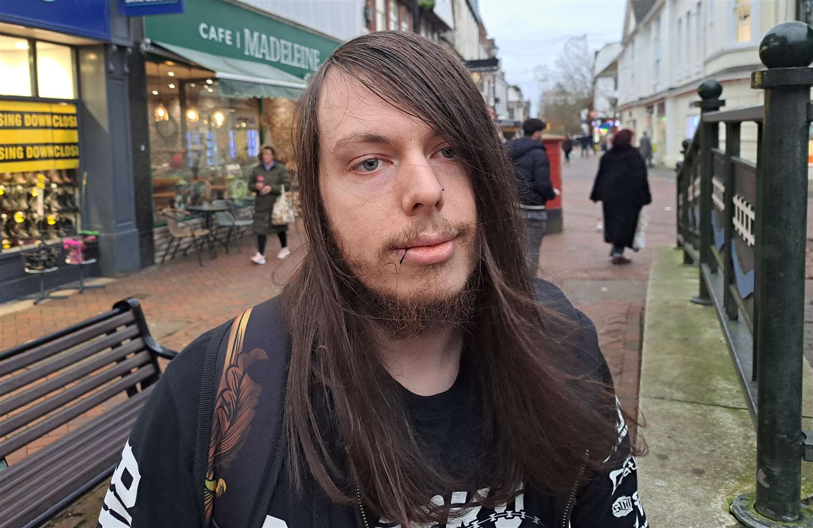 John Dinsdale, pictured in Ashford High Street, uses card for his Christmas shopping