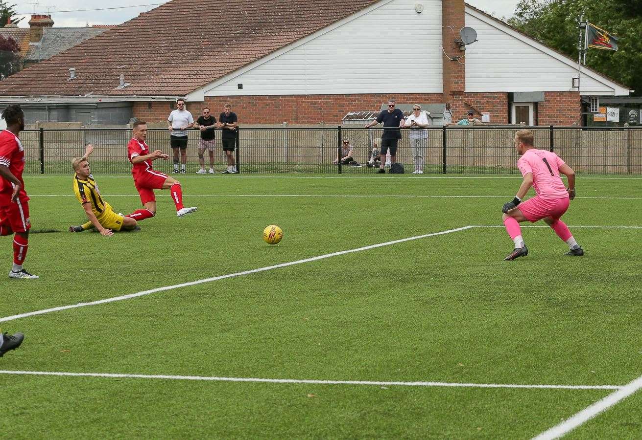 Josh Oliver of Whitstable scores the second. Picture: Les Biggs