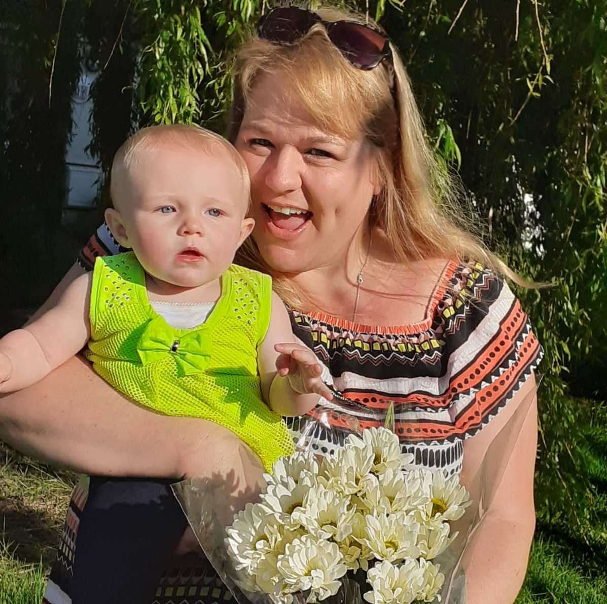 Kelly Ann Evans with her daughter Eliza-Rose Waters after receiving a hamper