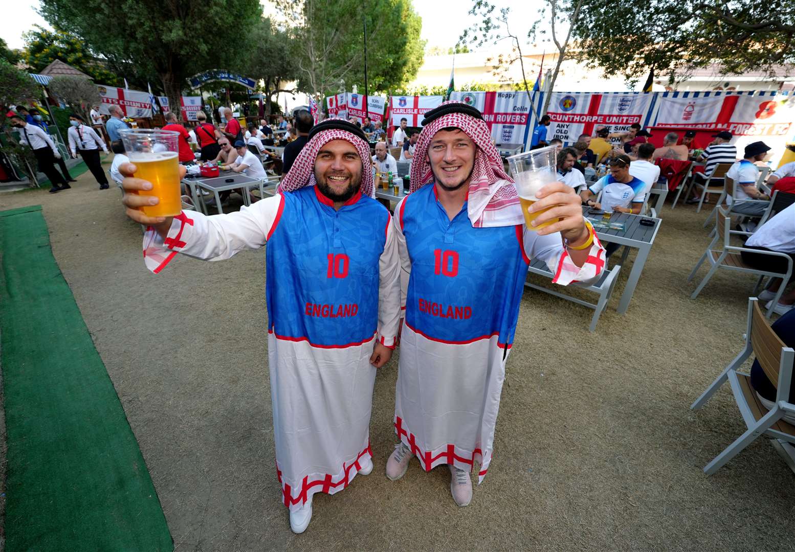 England fans Tom Egerton (left) and Tom King (right), at the Cabana Hop Garden in Doha (Nick Potts/PA)