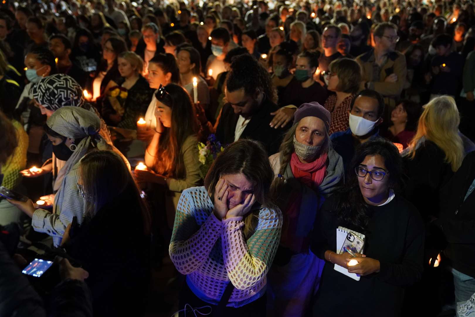 Members of the public attend a vigil in memory of Sabina Nessa (Jonathan Brady/PA)