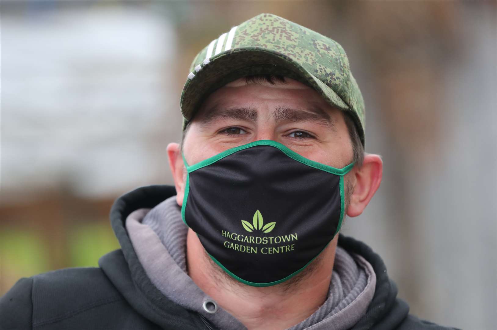 Alex Zelenov works at the Haggardstown Garden centre in Dundalk ahead of reopening (Niall Carson/PA)