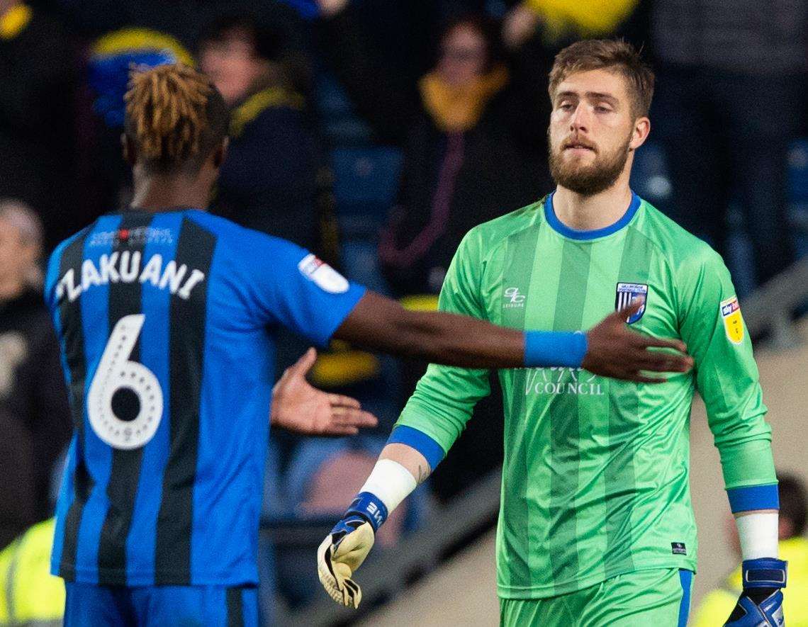 Frustration for Gills skipper Gabriel Zakuani after Tomas Holy's clash with Marcus Browne gave Oxford a penalty Picture: Ady Kerry