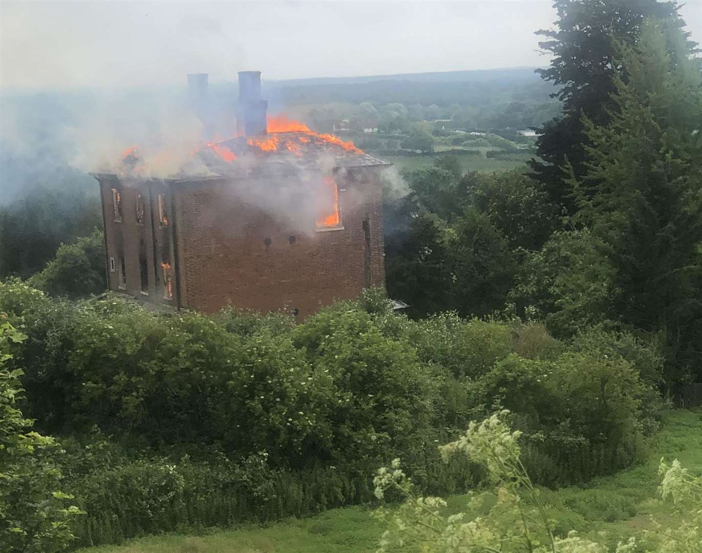 The house on fire in Sutton Valence. Picture Carole Sinclair-Smith