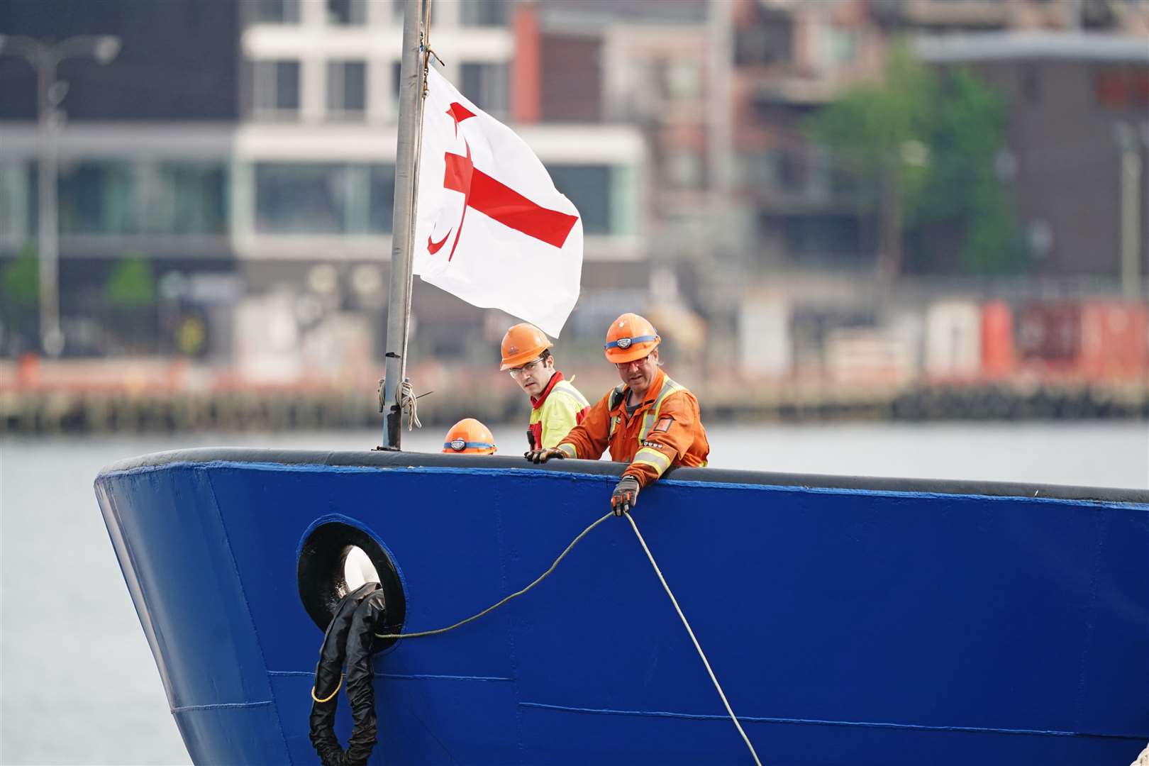 Flags were at half-mast on the ship (Jordan Pettitt/PA)