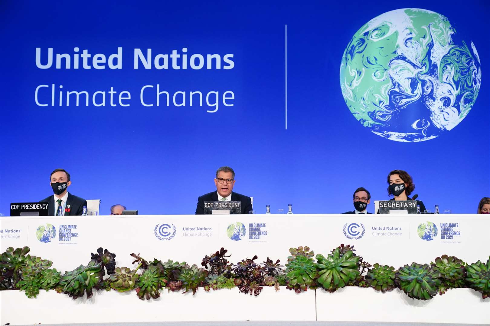 Alok Sharma (centre), president of the Cop26 climate summit, speaks at the conference in Glasgow (Jane Barlow/PA)