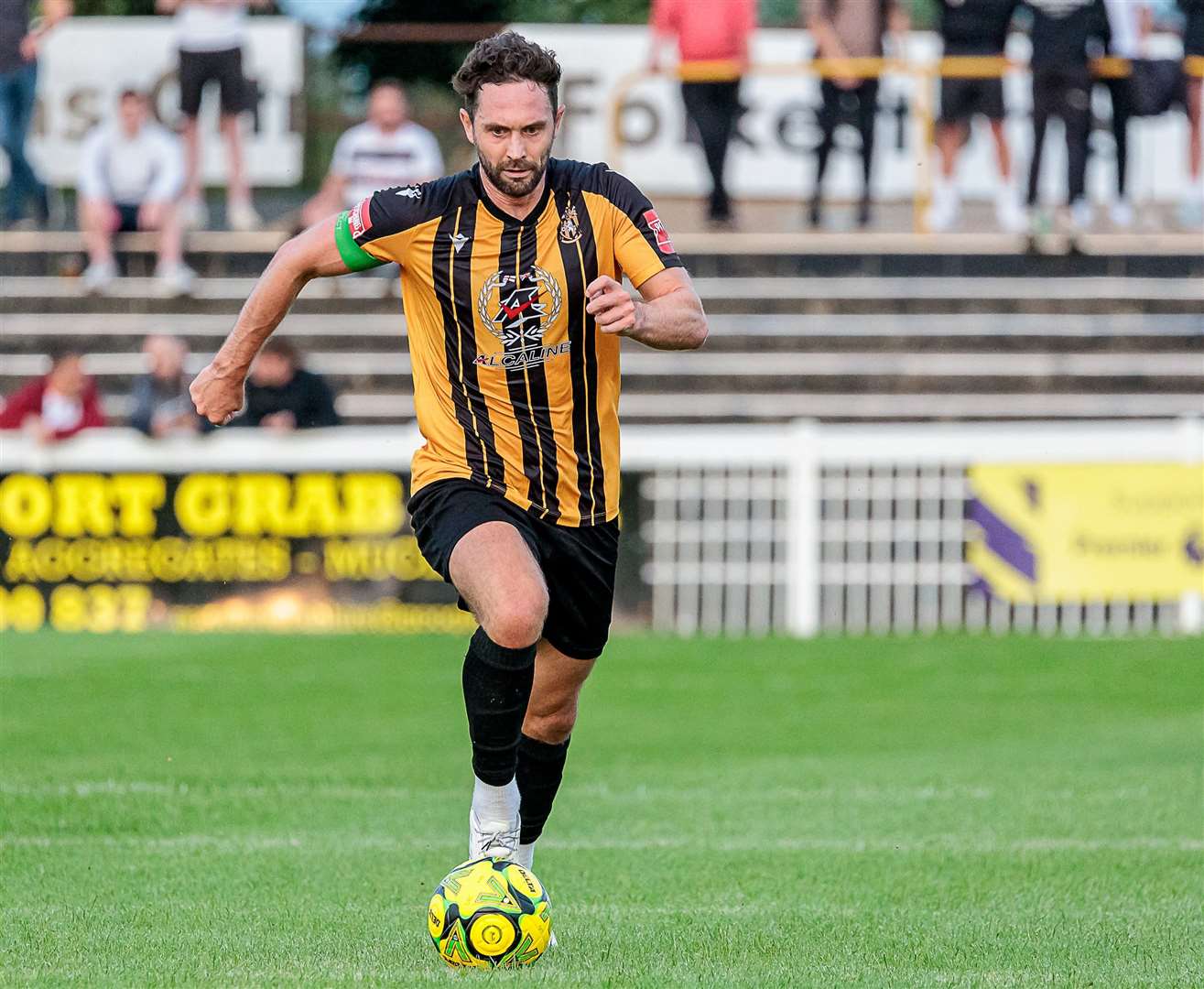 Folkestone captain Dean Rance drives forward against Deal. Picture: Helen Cooper