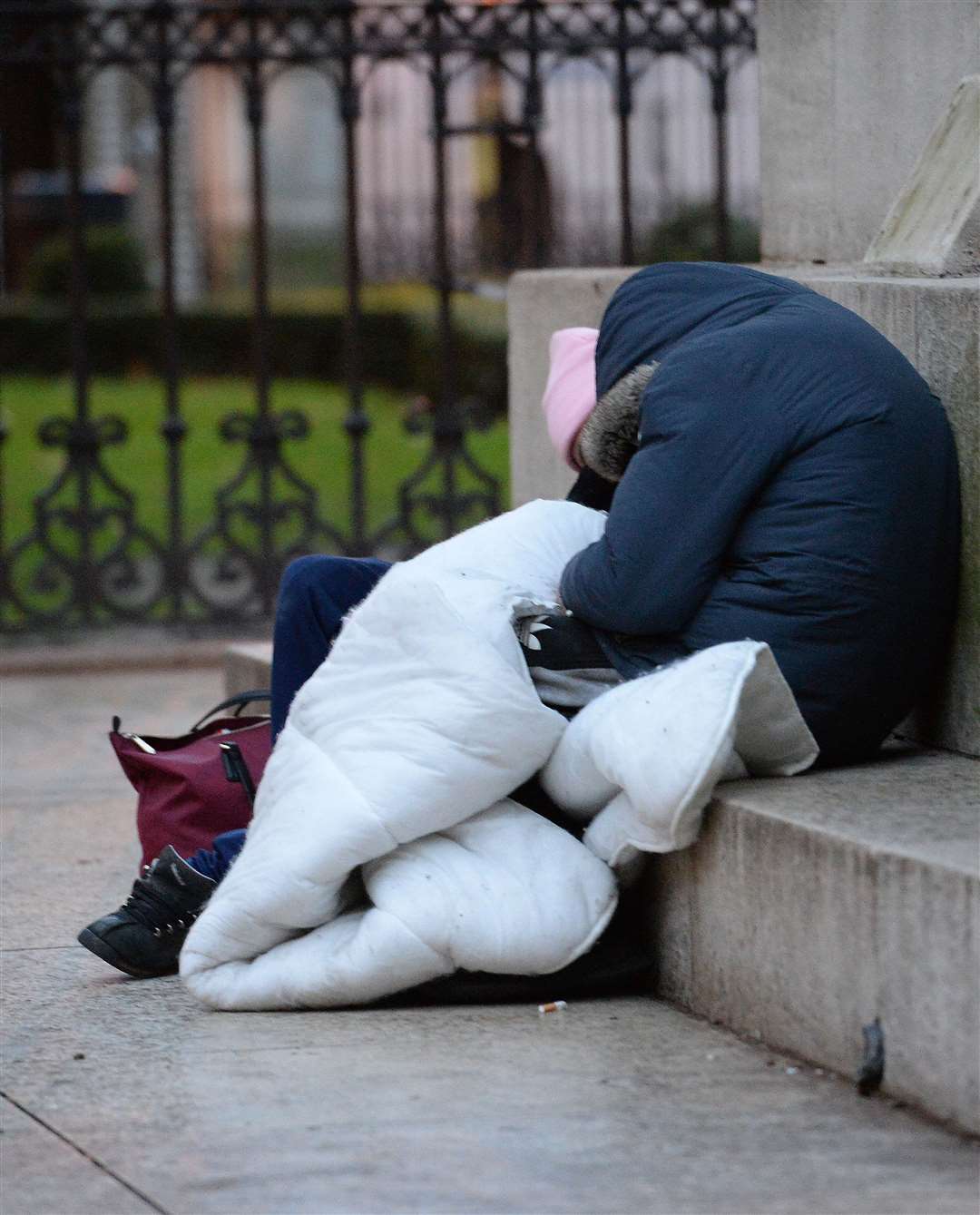 Homeless people sleep on the plinth of the Ferdinand Foch equestrian statue in Victoria, London (Nick Ansell/PA)