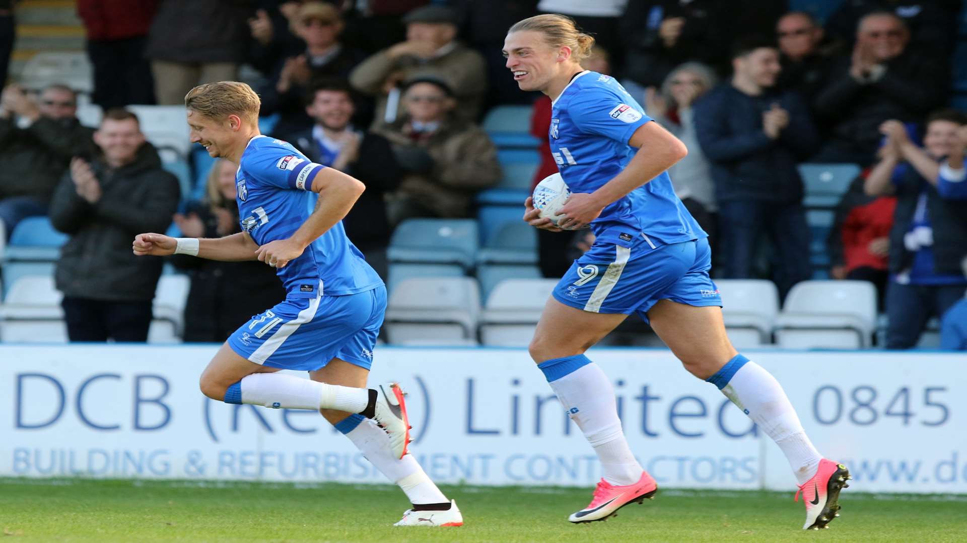 ...and then celebrates with Tom Eaves. Picture: Andy Jones