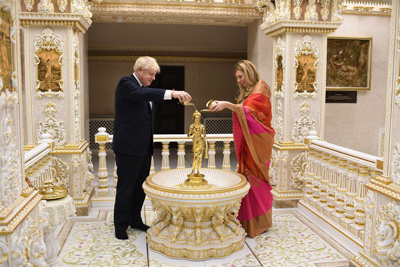 The PM and his partner visit a Hindu temple on the general election campaign trail last year (Andrew Parsons/Conservative Party/PA)