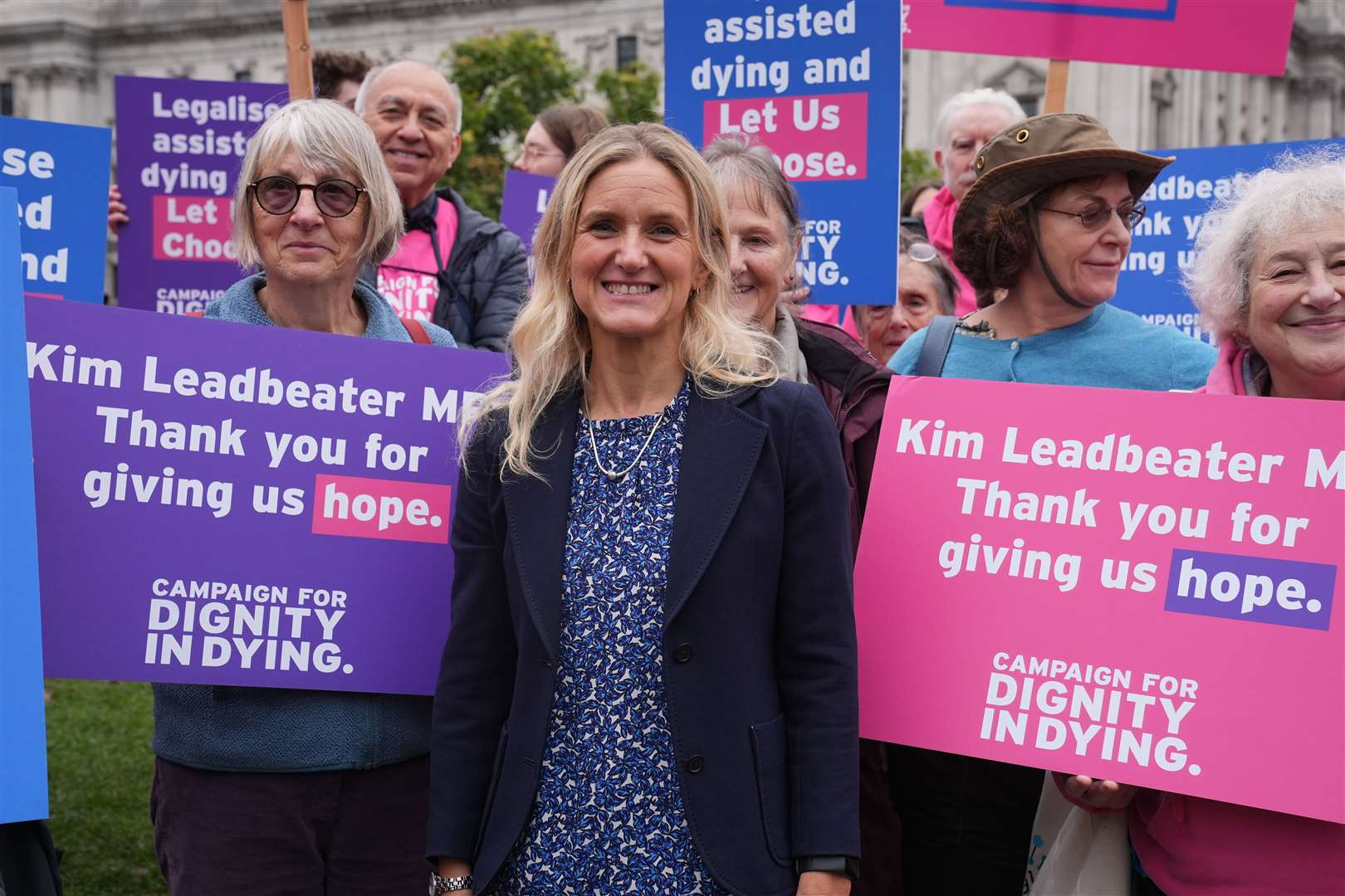 Labour MP Kim Leadbeater, pictured with Dignity in Dying campaigners, is bringing the Bill forward for Parliament to decide (Lucy North/PA)