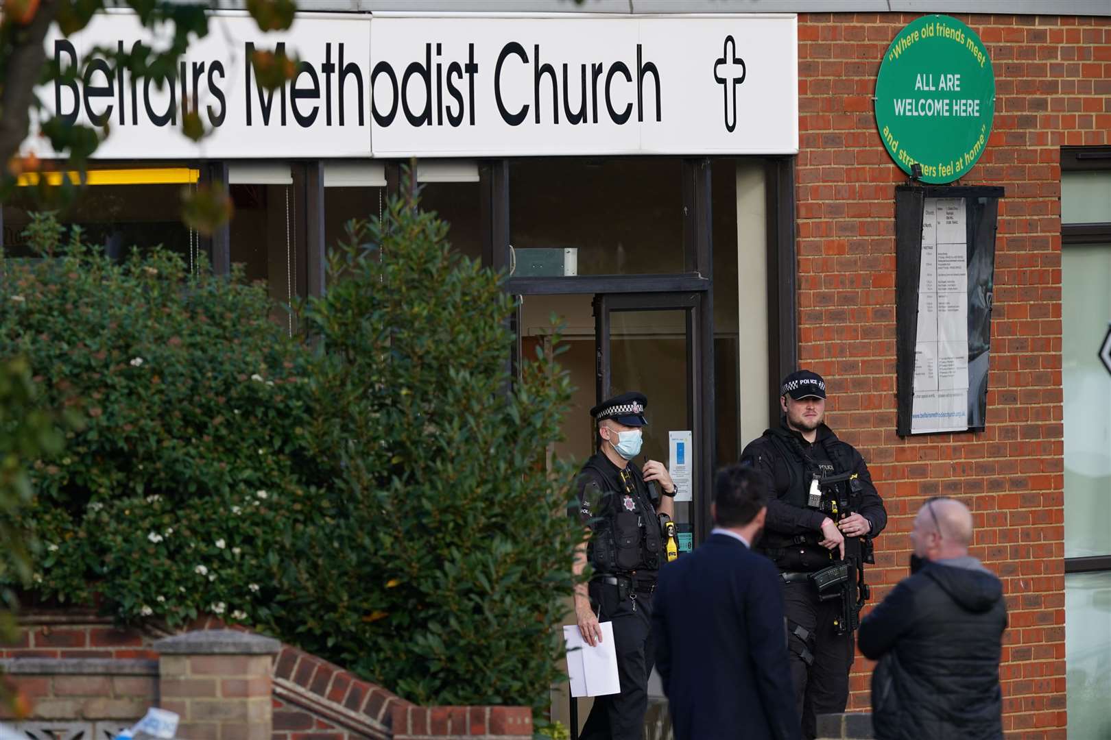 Armed police officers at the scene near the Belfairs Methodist Church in Eastwood Road North (Yui Mok/PA)