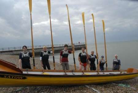 Canon Edward Condry, right, with some of the cross-Channel row crew. Picture: Barry Duffield