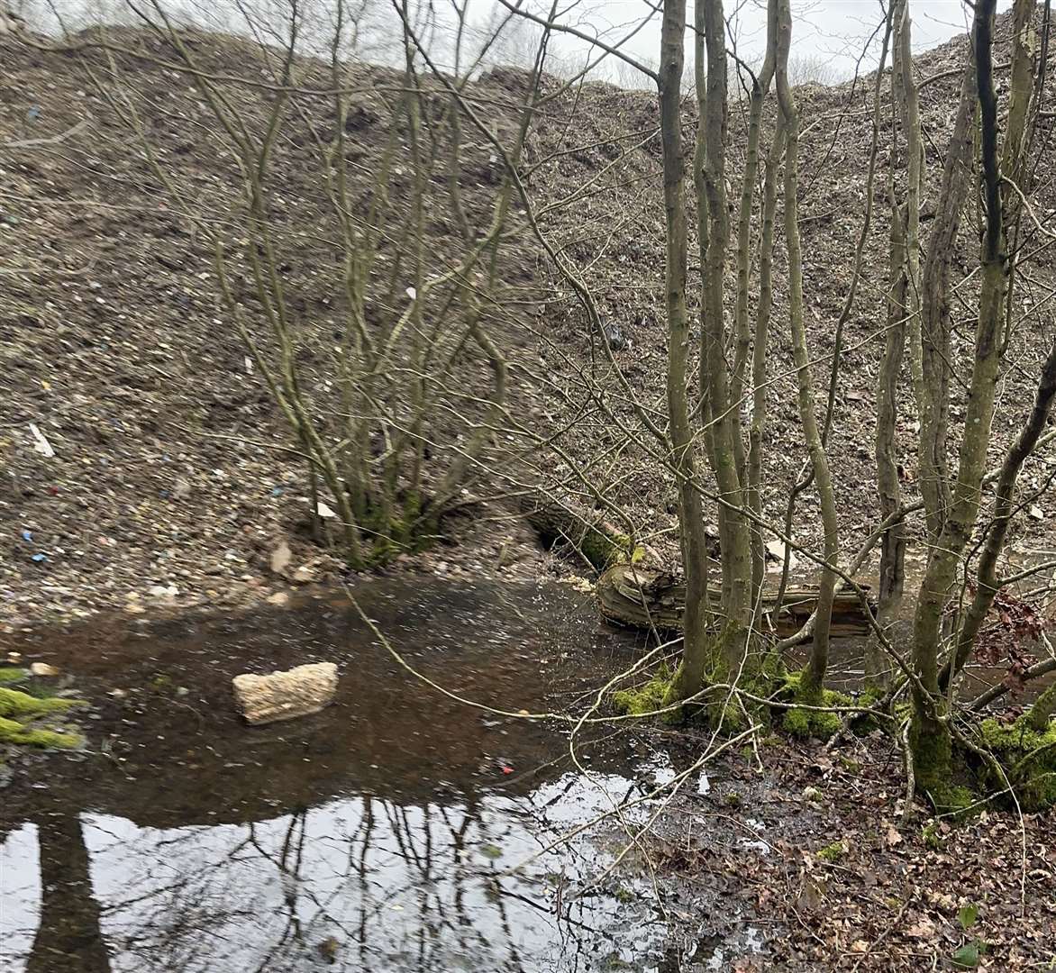 The rubbish has been piled 12ft high across four acres at Hoad’s Wood in Great Chart. Picture: Kent Wildlife Trust