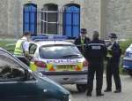 Police officers at the scene of the attack. Picture by John Wardley