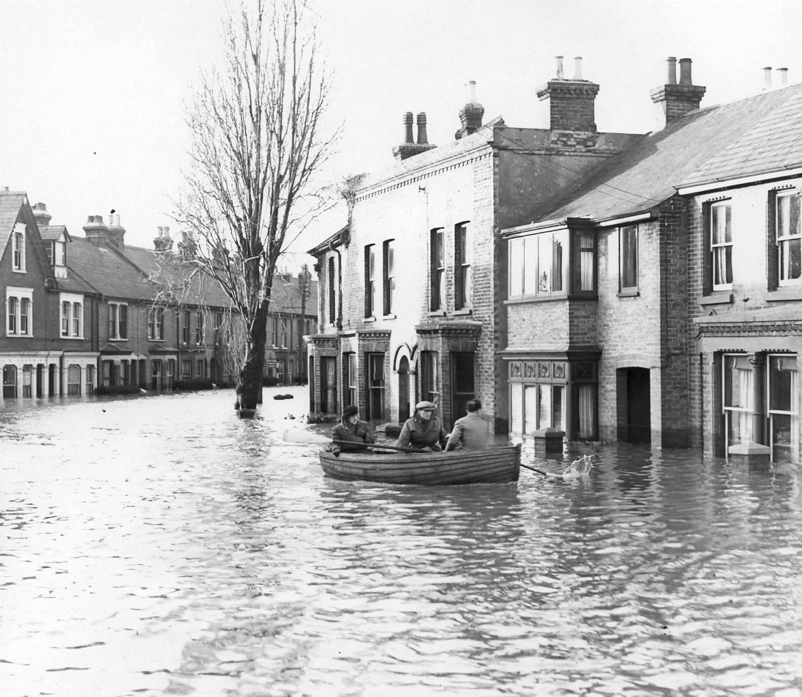 A boat rescues residents from Nelson Road, Whitstable