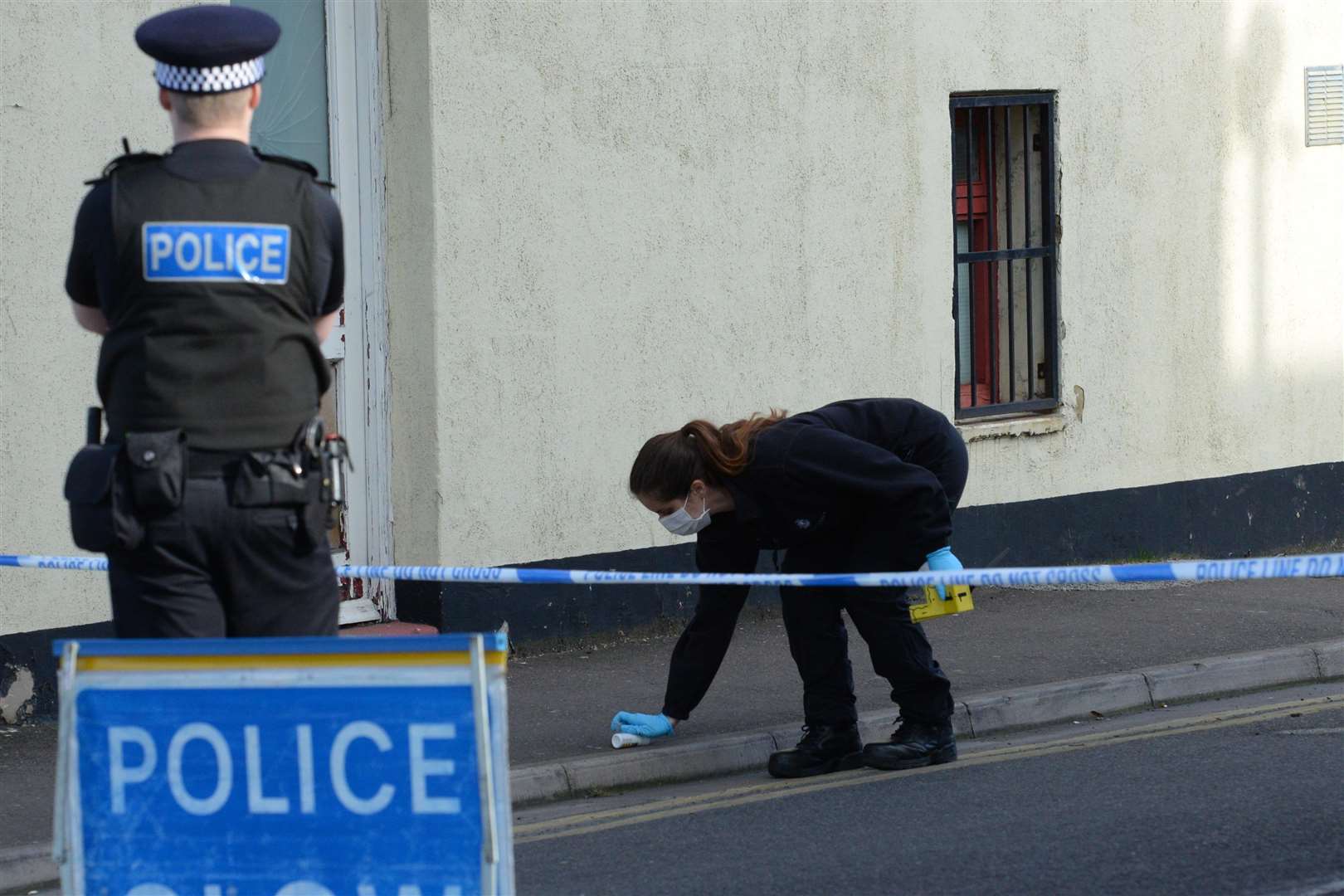 A forensic officer at work in Lock Street, Gillingham Picture: Chris Davey