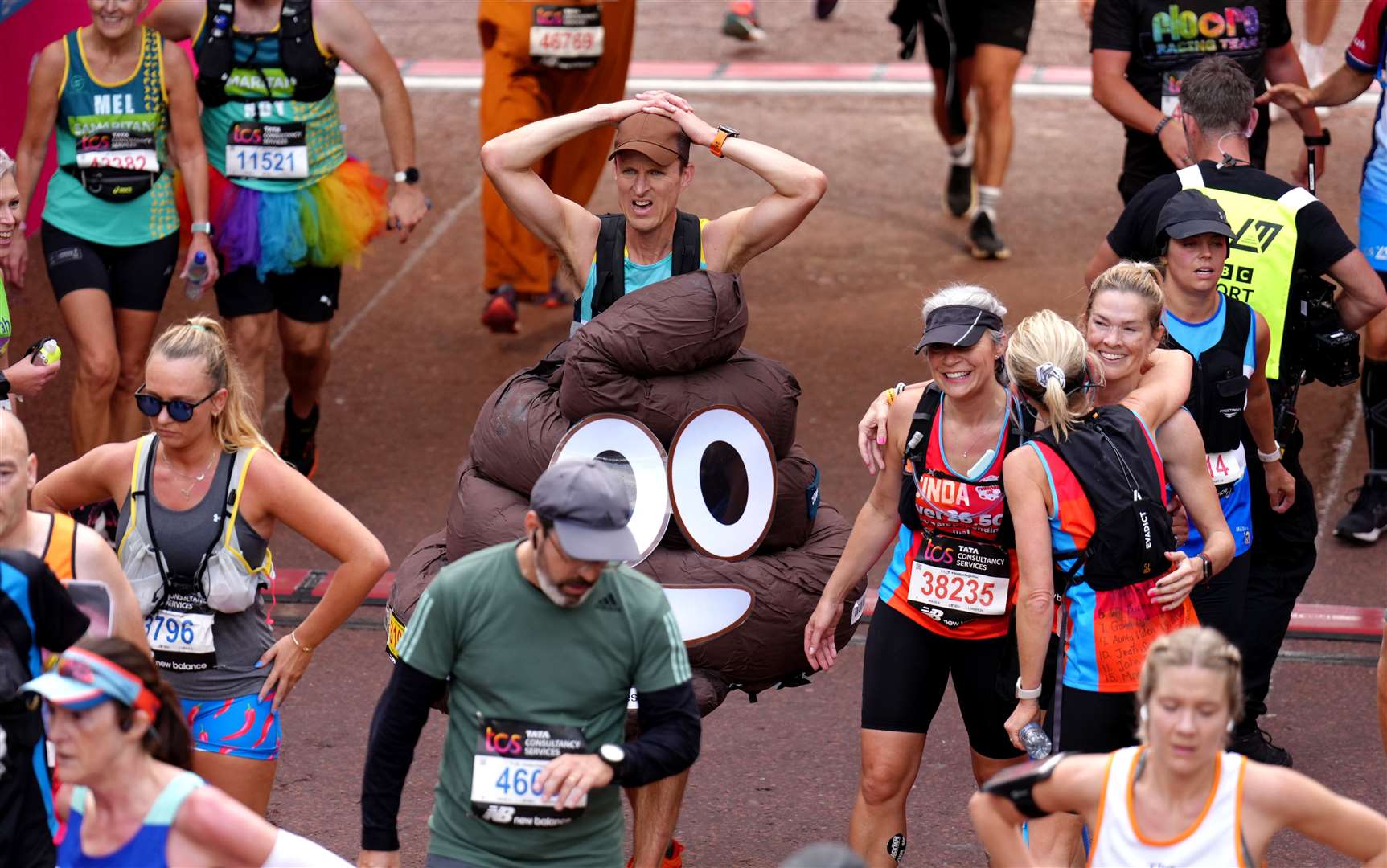 One person sported a popular emoji costume for the race (John Walton/PA)