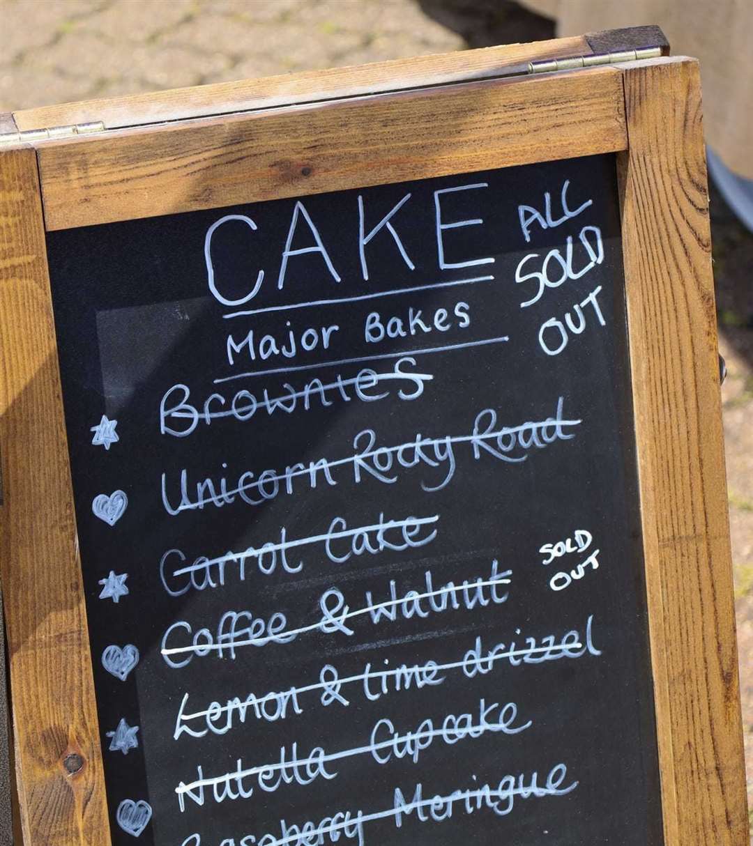 Queenborough Harbour's first quayside market on Saturday attracted crowds and several stalls like the cake stall, which soon sold out. Picture: Queenborough Harbour Trust