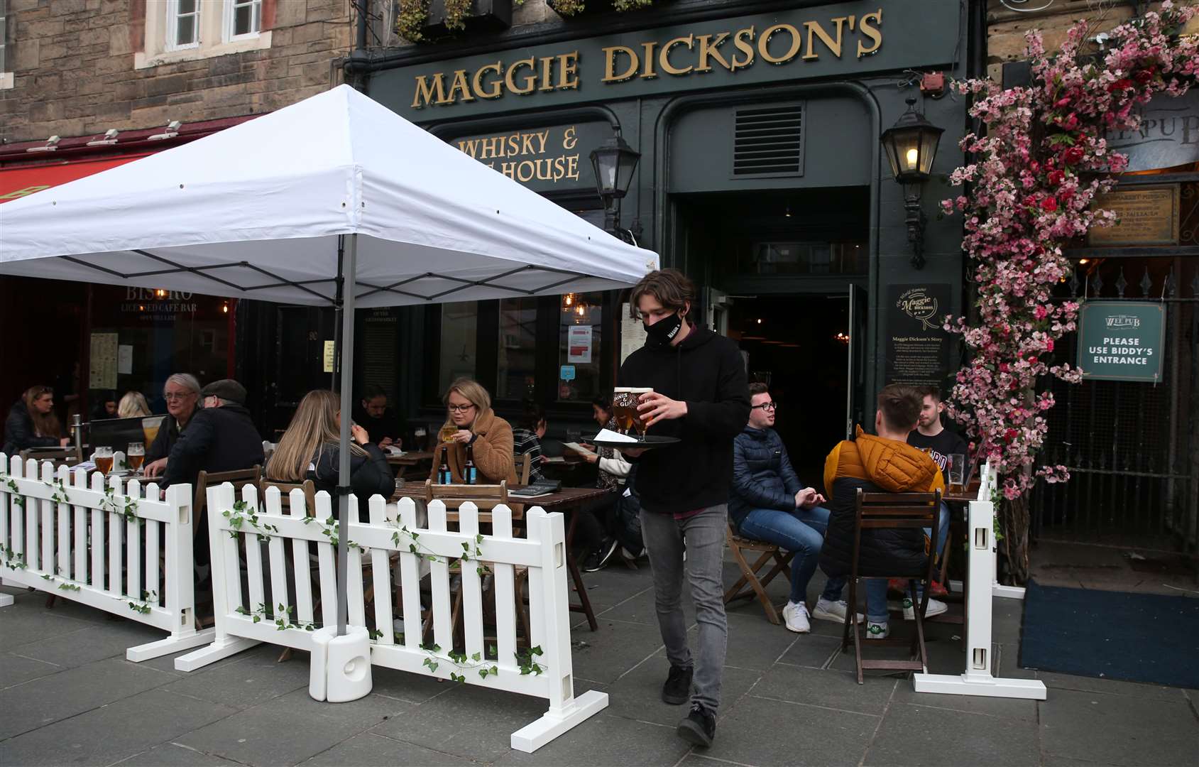 Pubs are currently only allowed to sell alcohol in their outdoor areas (Andrew Milligan/PA)