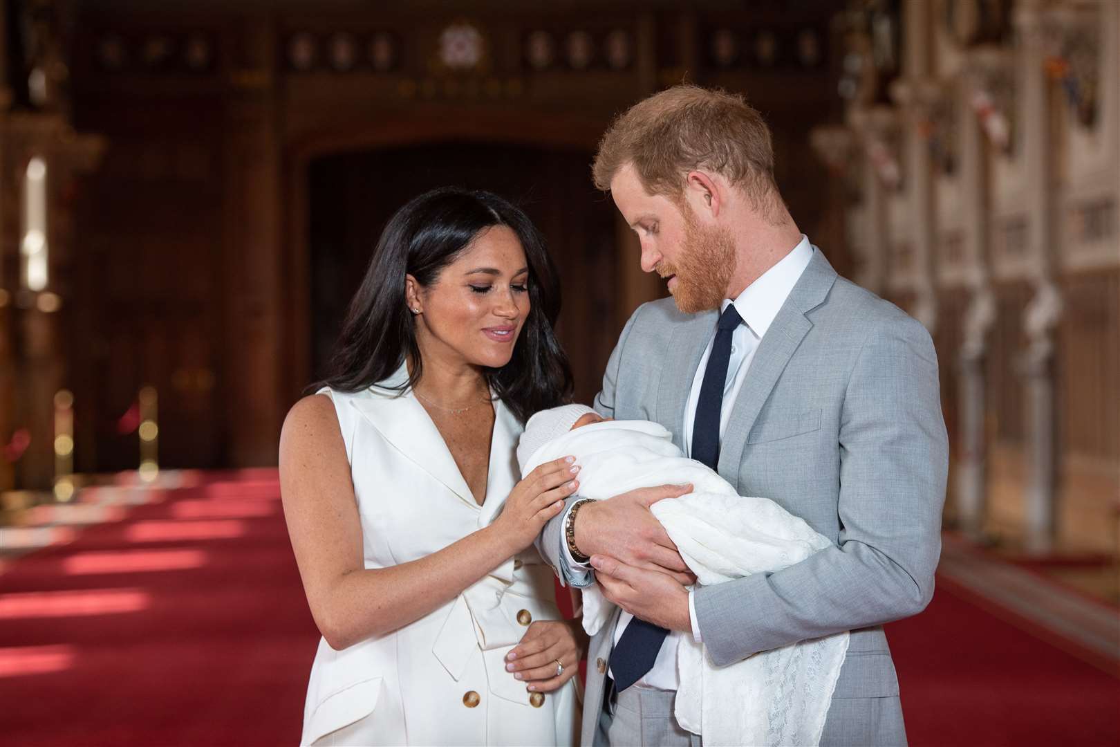 Archie with his parents a few days after he was born (Dominic Lipinski/PA)