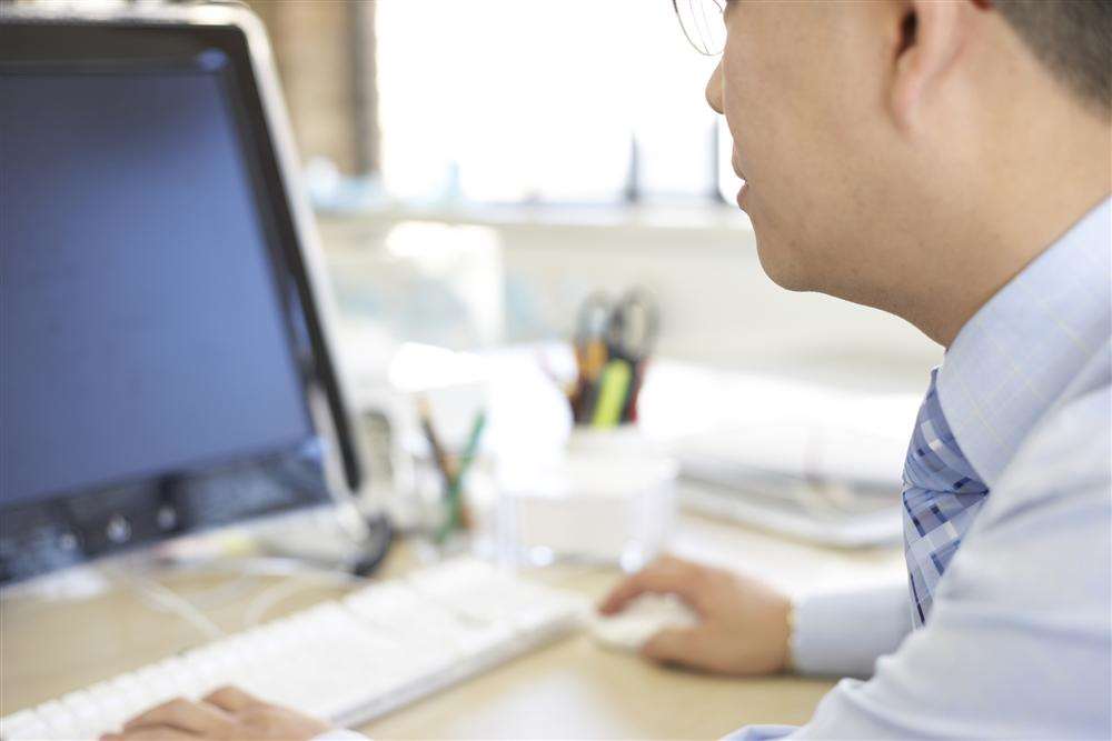 A man working at a computer