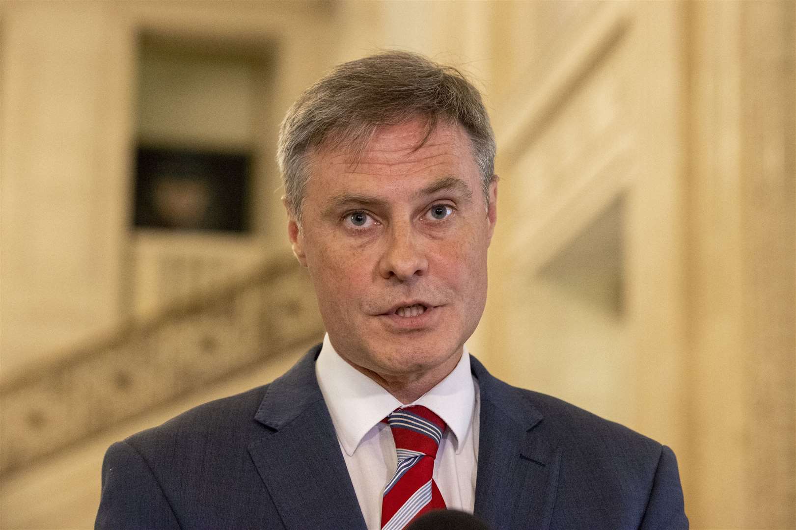 DUP MLA for north Antrim Paul Frew at Stormont who has taken on the role as Northern Ireland Economy Minister (Liam McBurney/PA)