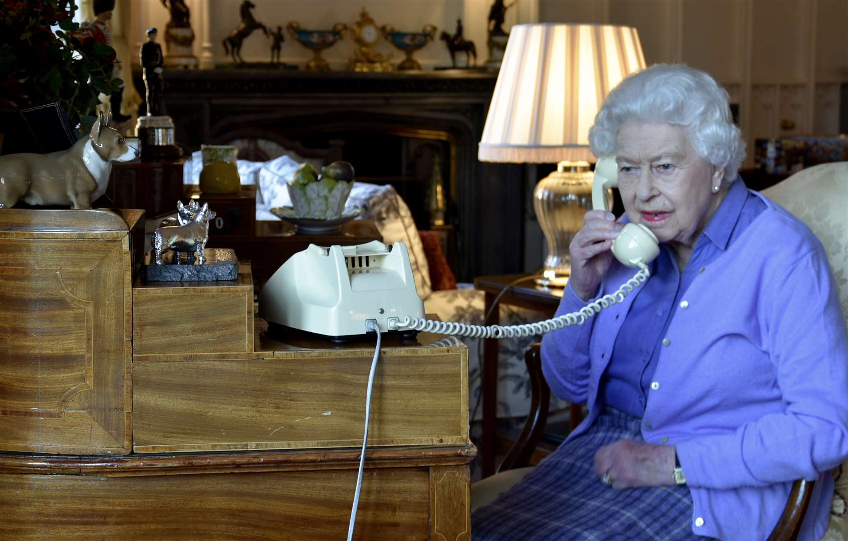 The Queen has been conducting some of her duties by phone due to the lockdown and is pictured holding her weekly audience with Prime Minister Boris Johnson (PA)