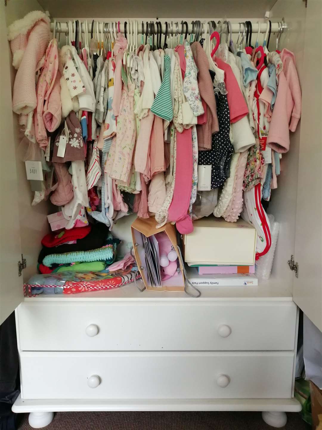 The excited parents spent thousands kitting out their baby girl's room. Picture: SWNS