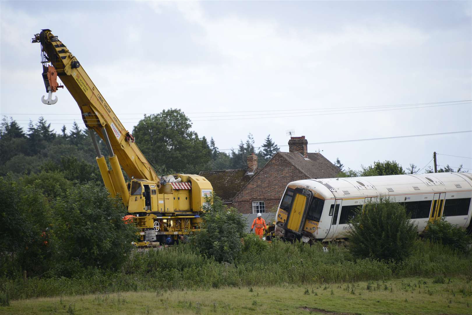 A crane lifted the derailed train back onto the tracks